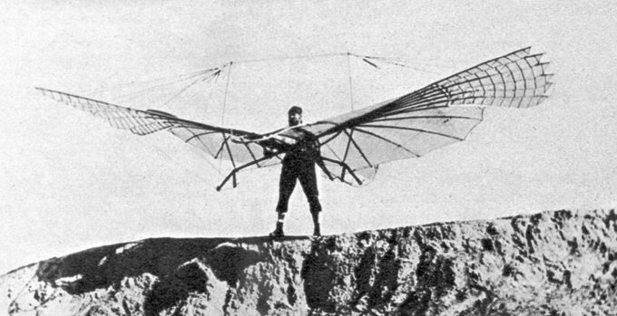 German aviator Otto Lilienthal shown with one of his experiments with gliders, based on his close study of birds.