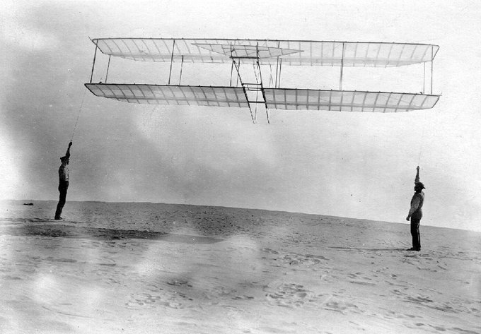 The Wright Brothers with one of their own large-scale kites with which they compared the lift they were able to achieve with Otto Lilienthal's results.